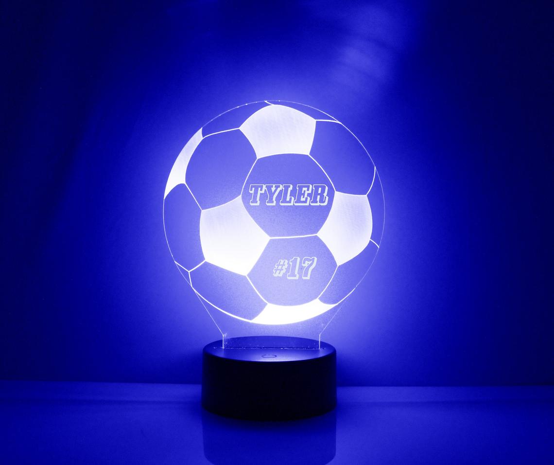 led trophy in a football shape